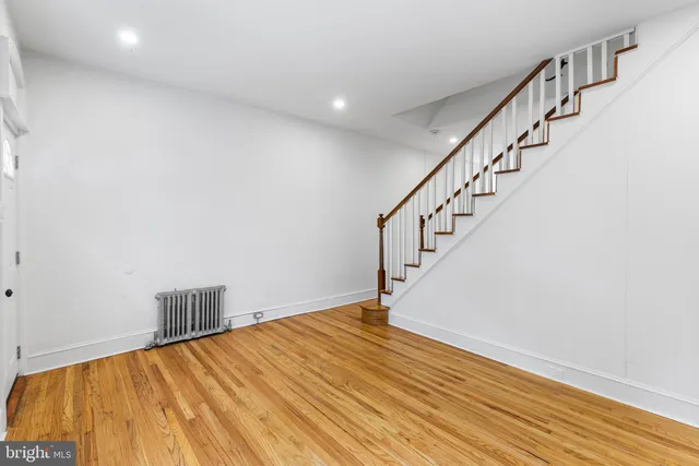 a view of entryway with wooden floor