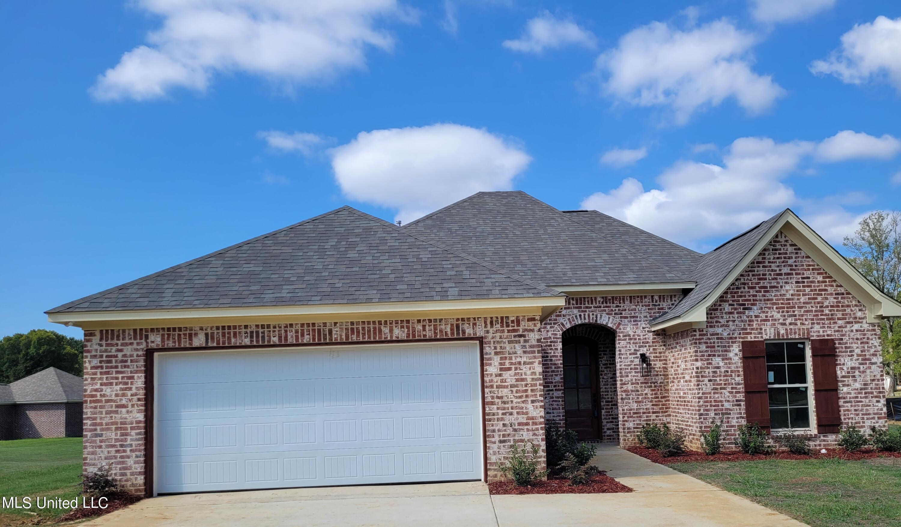 303 Maple Cove Canton, MS 39046 - Photo 1 of 17 303 Maple Cove front