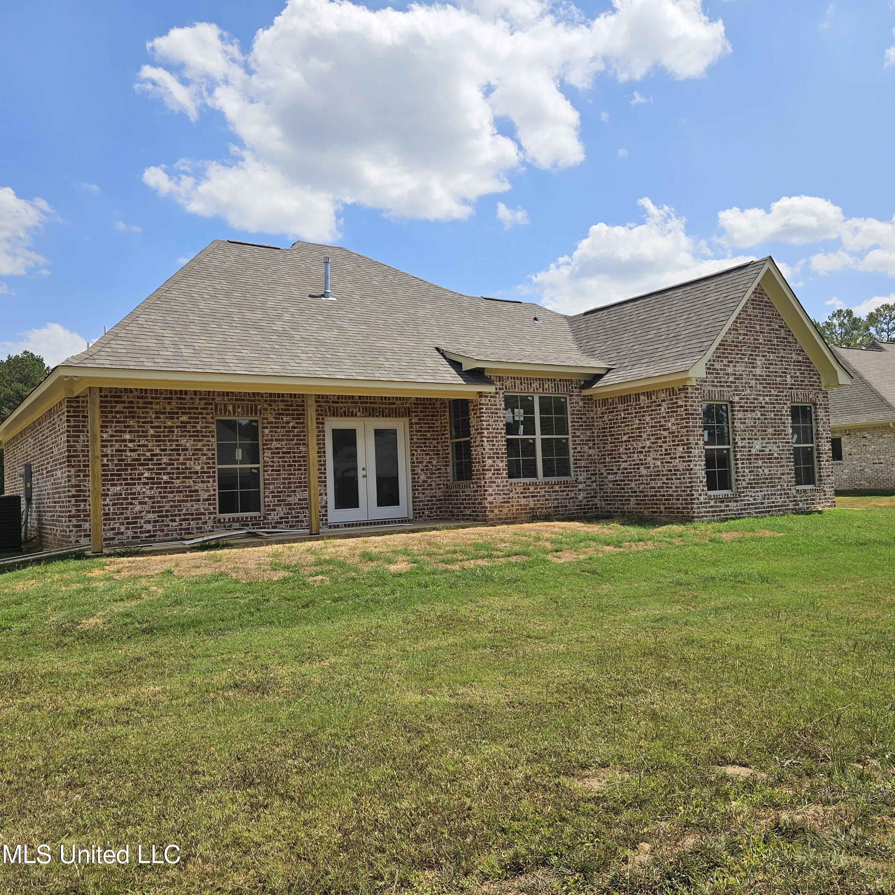 303 Maple Cove Canton, MS 39046 - Photo 11 of 17 Backyard view