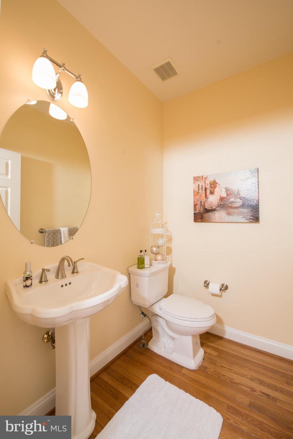 2604 Howard Grove Road Davidsonville, MD 21035 - Photo 16 of 36 Main Floor Half Bath w/Hardwood Floor