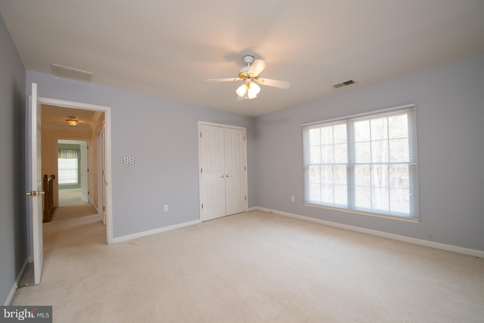 2604 Howard Grove Road Davidsonville, MD 21035 - Photo 25 of 36 3rd Bedroom w/Ceiling Fan & Light