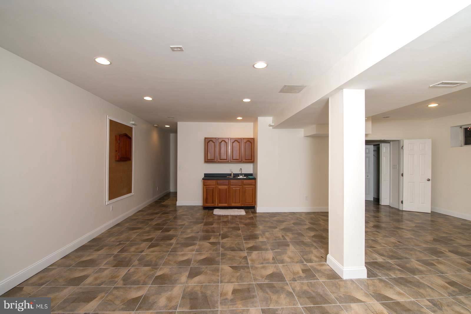 2604 Howard Grove Road Davidsonville, MD 21035 - Photo 31 of 36 Lower Level Rec Room with Wet Bar