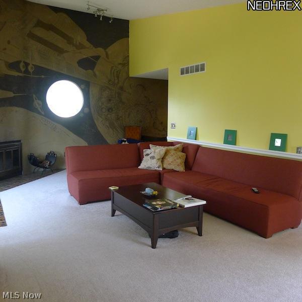 935 Hampton Ridge Drive Akron, OH 44313 - Photo 18 of 23 Don Drumm wall with fireplace!