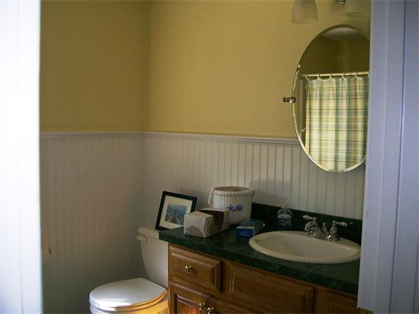 2 Forge Lane Sutton, MA 01590 - Photo 14 of 18 a bathroom with a toilet sink vanity mirror and tub