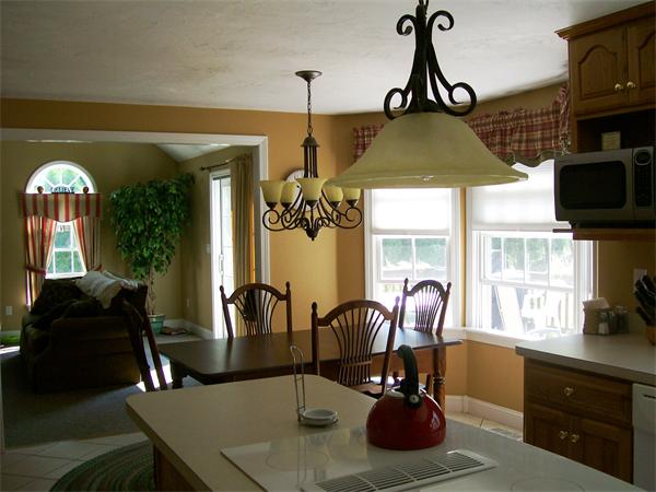 2 Forge Lane Sutton, MA 01590 - Photo 10 of 18 a view of a dining room with furniture window and outside view