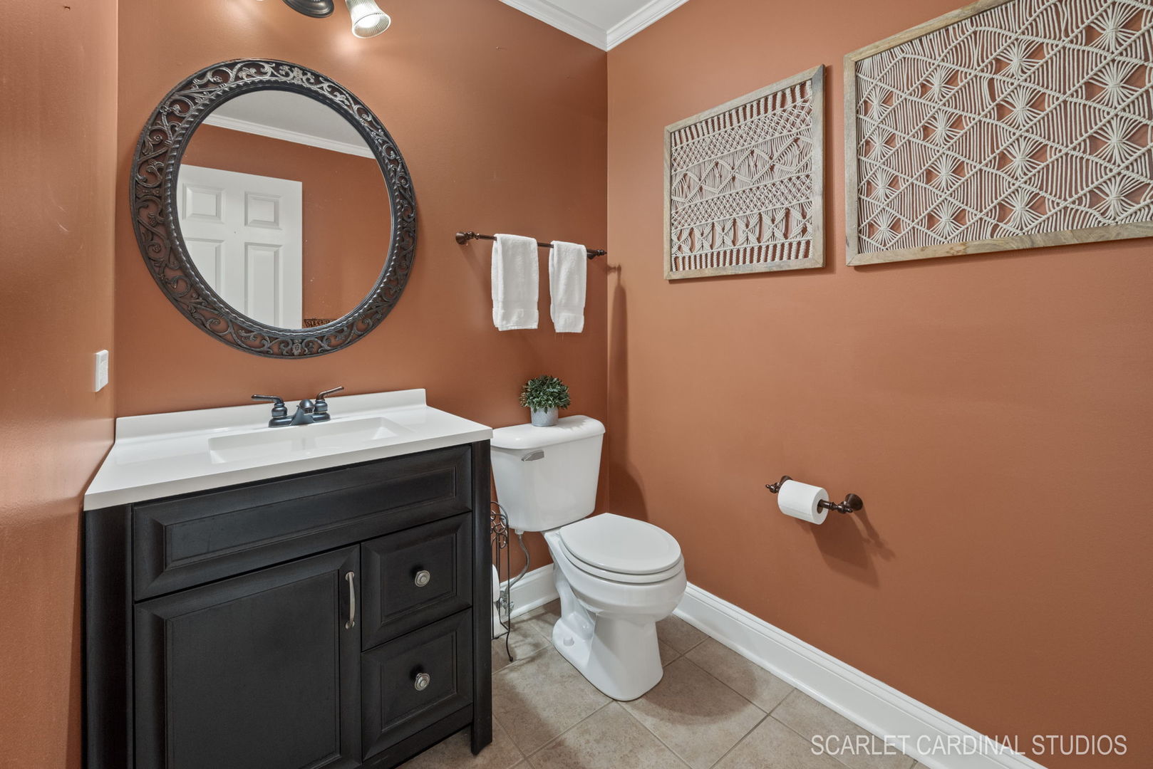 312 Veronica Circle Bartlett, IL 60103 - Photo 13 of 45 a bathroom with a toilet a sink and a mirror