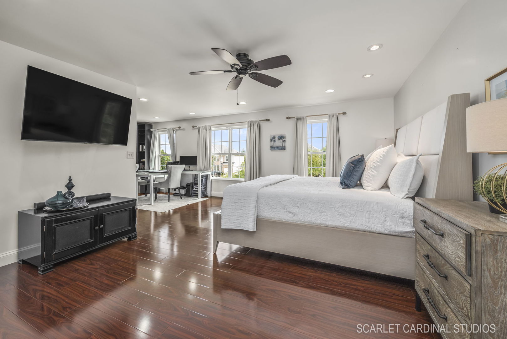 312 Veronica Circle Bartlett, IL 60103 - Photo 19 of 45 a bedroom with a large bed and a flat screen tv