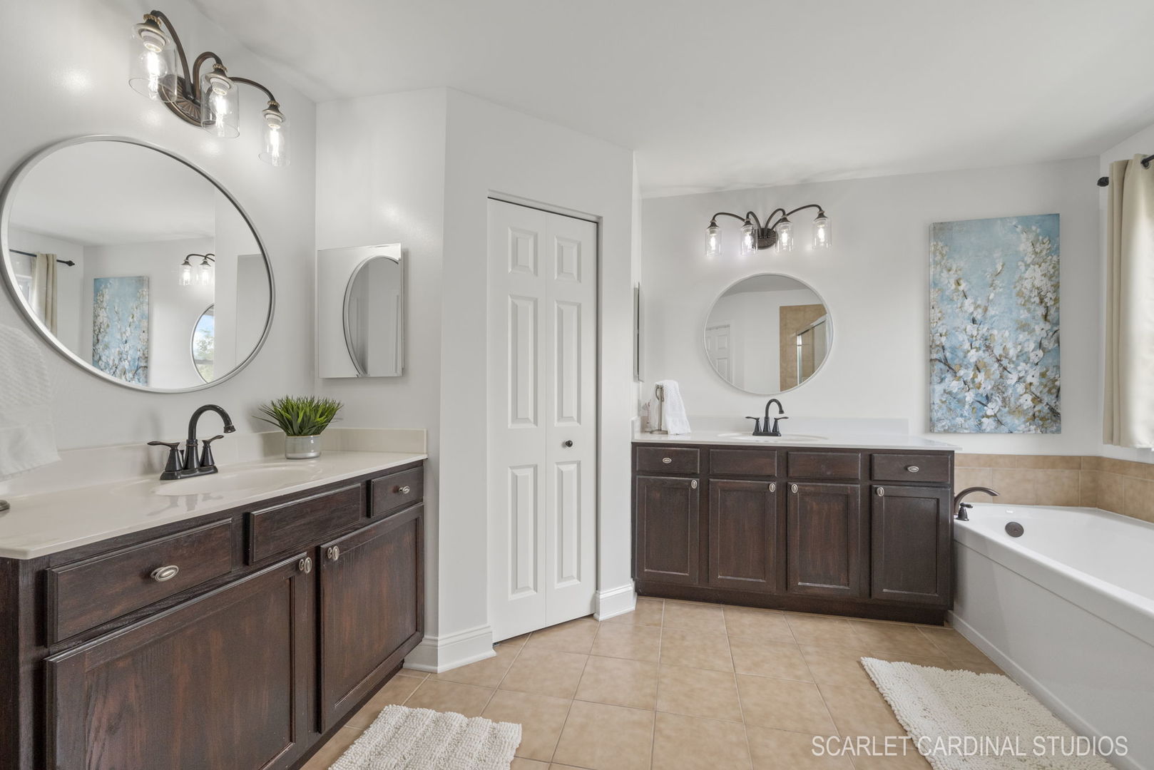312 Veronica Circle Bartlett, IL 60103 - Photo 22 of 45 a spacious bathroom with a double vanity sink and a mirror