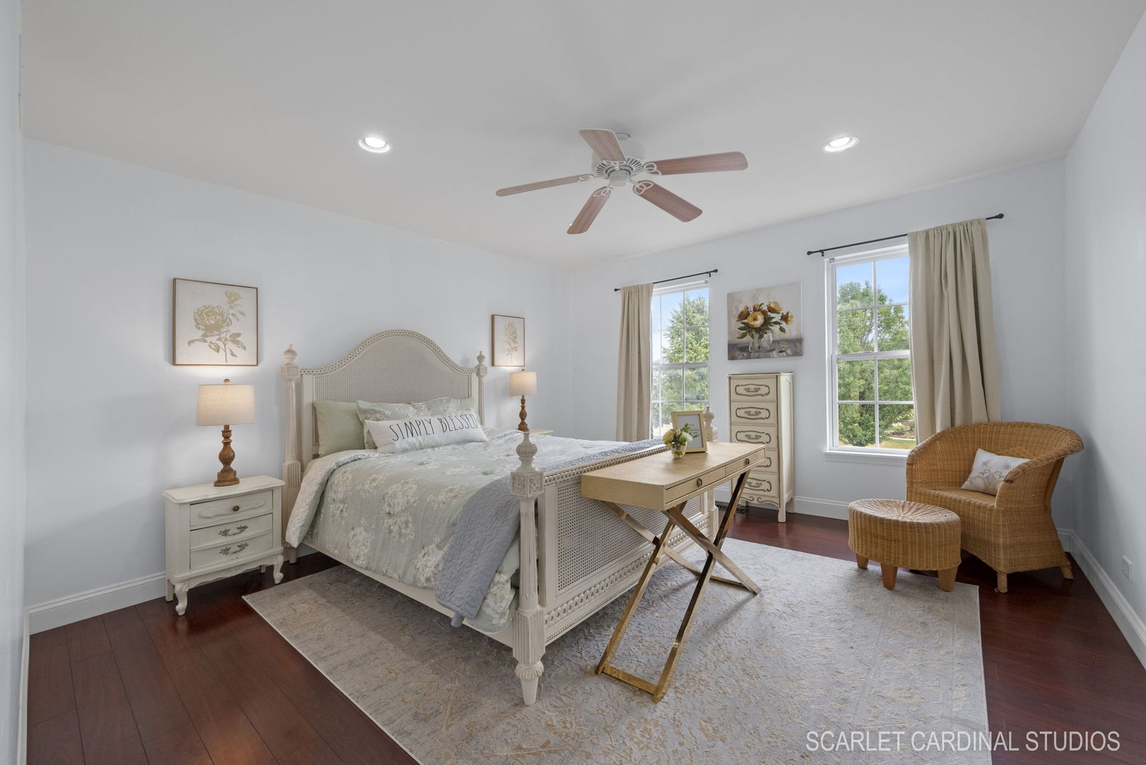 312 Veronica Circle Bartlett, IL 60103 - Photo 24 of 45 a bedroom with a bed chairs and a window
