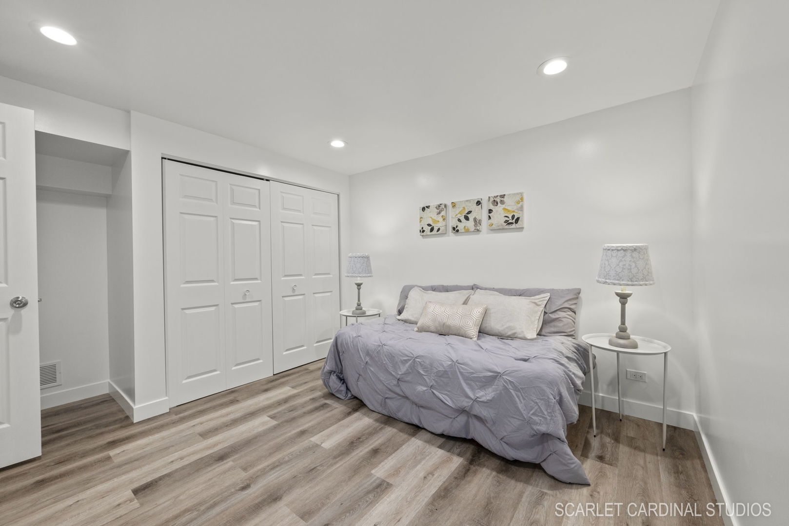 312 Veronica Circle Bartlett, IL 60103 - Photo 32 of 45 a living room with a bed and a view of bathroom