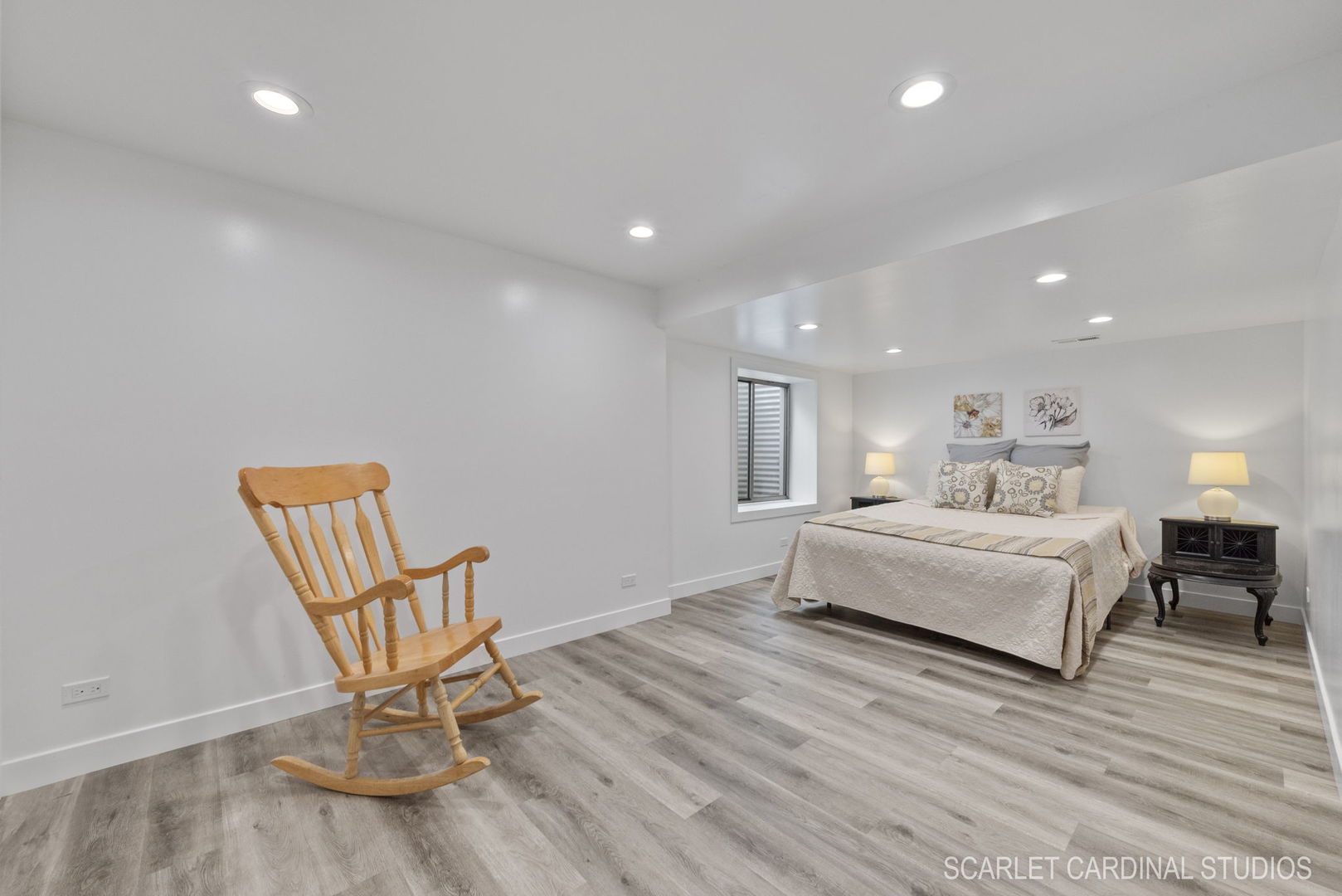 312 Veronica Circle Bartlett, IL 60103 - Photo 34 of 45 a spacious bedroom with a bed a chair and potted plant on table