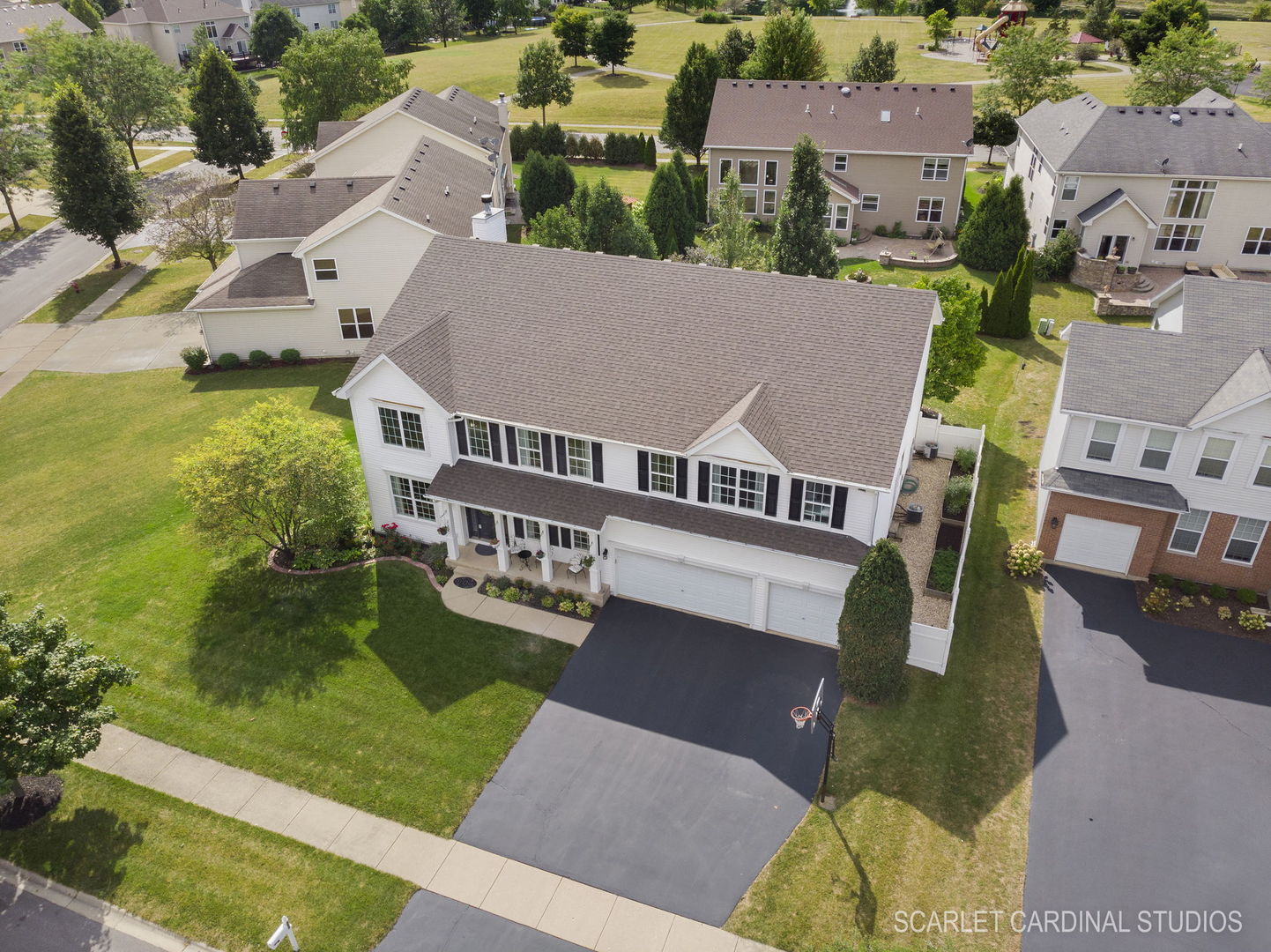 312 Veronica Circle Bartlett, IL 60103 - Photo 42 of 45 an aerial view of residential houses with outdoor space and trees