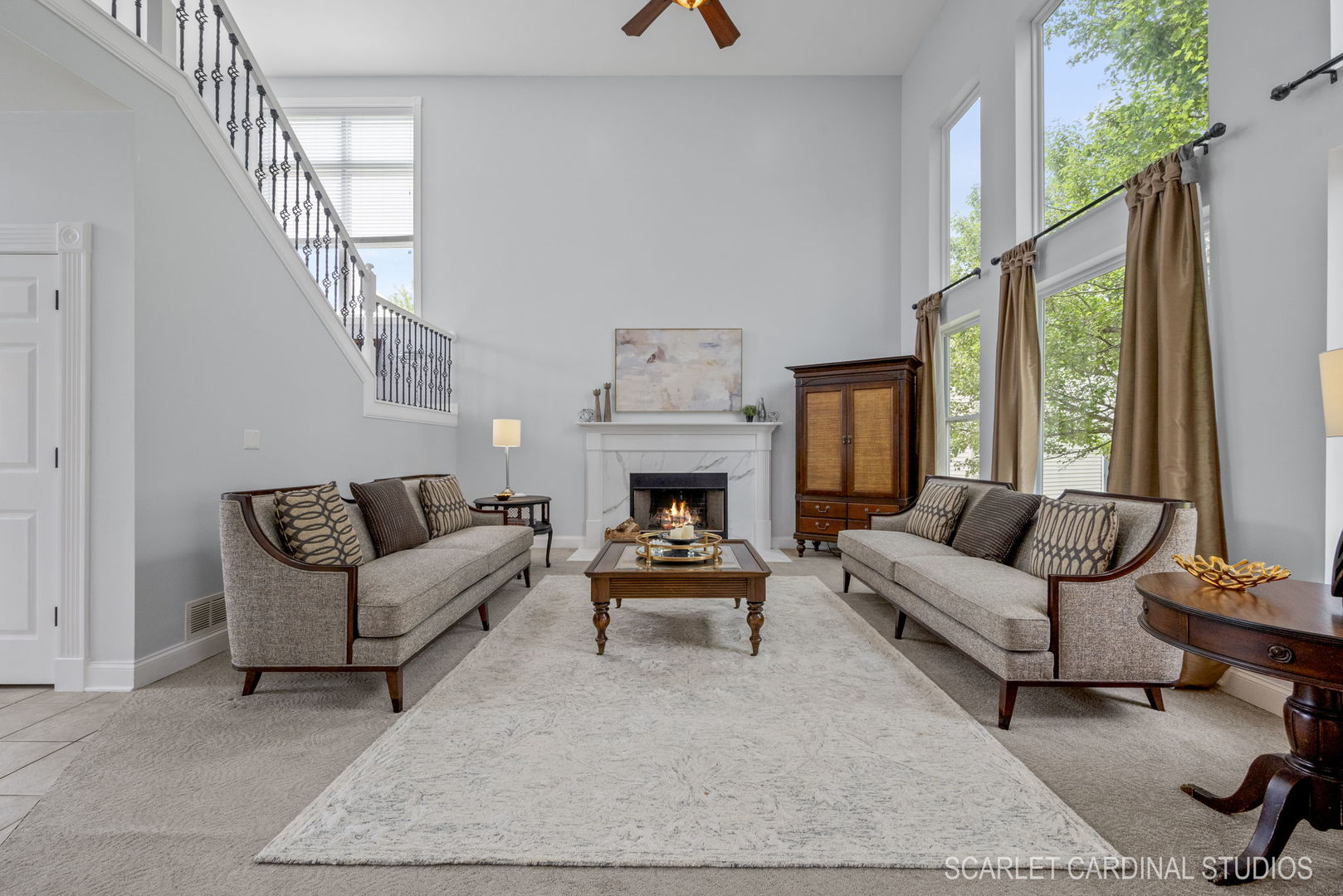 312 Veronica Circle Bartlett, IL 60103 - Photo 7 of 45 a living room with furniture a large window and a fireplace