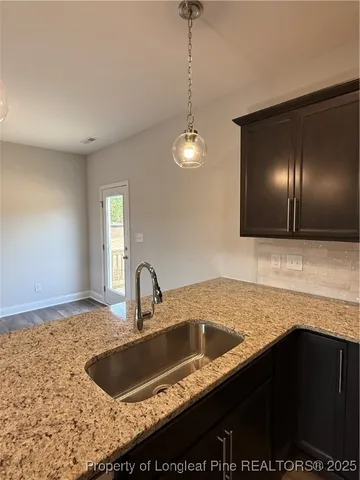 a spacious bathroom with a double vanity sink and a mirror