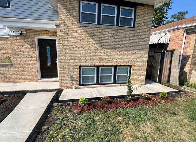 a front view of a house with stairs