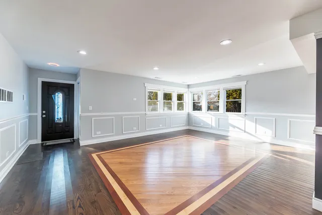 a kitchen with stainless steel appliances a sink and cabinets