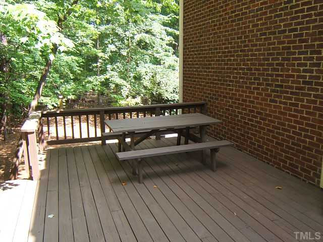 1908 Partridge Berry Drive Raleigh, NC 27606 - Photo 10 of 12 Huge deck with ample space for a picnic table and other outdoor furniture. Patio/Deck
