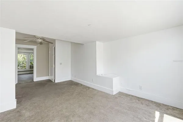 a view of an empty room and window