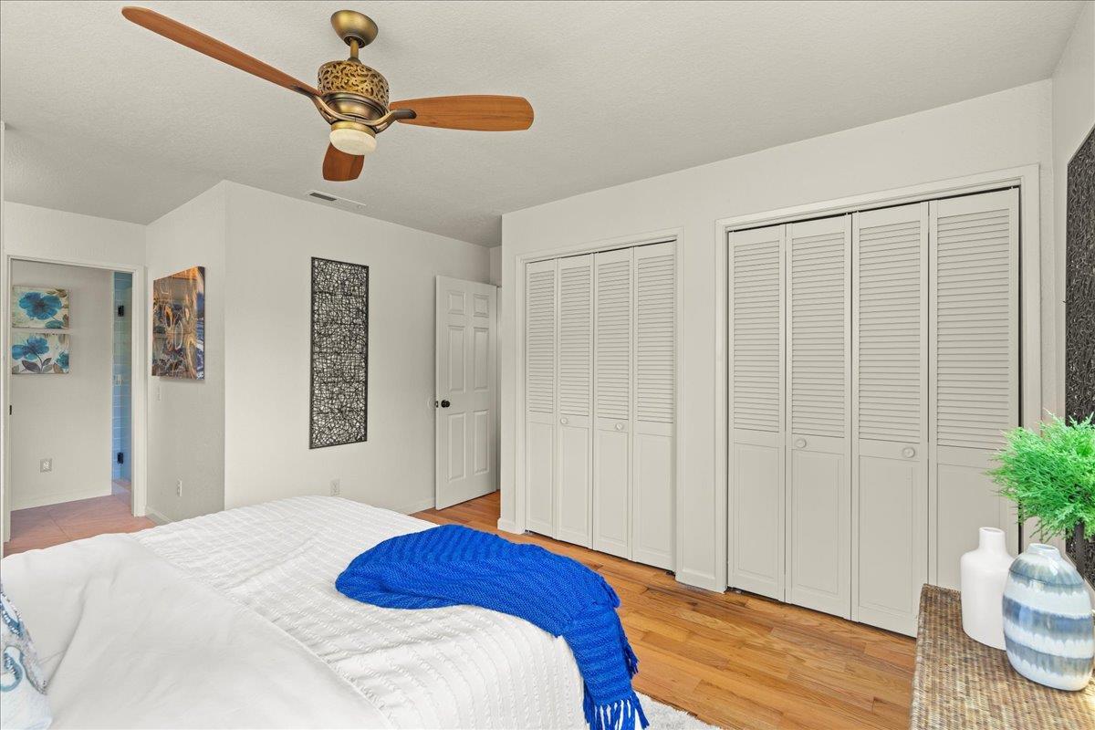 6109 Sheraton Place Aptos, CA 95003 - Photo 12 of 31 a bedroom with a bed and a potted plant