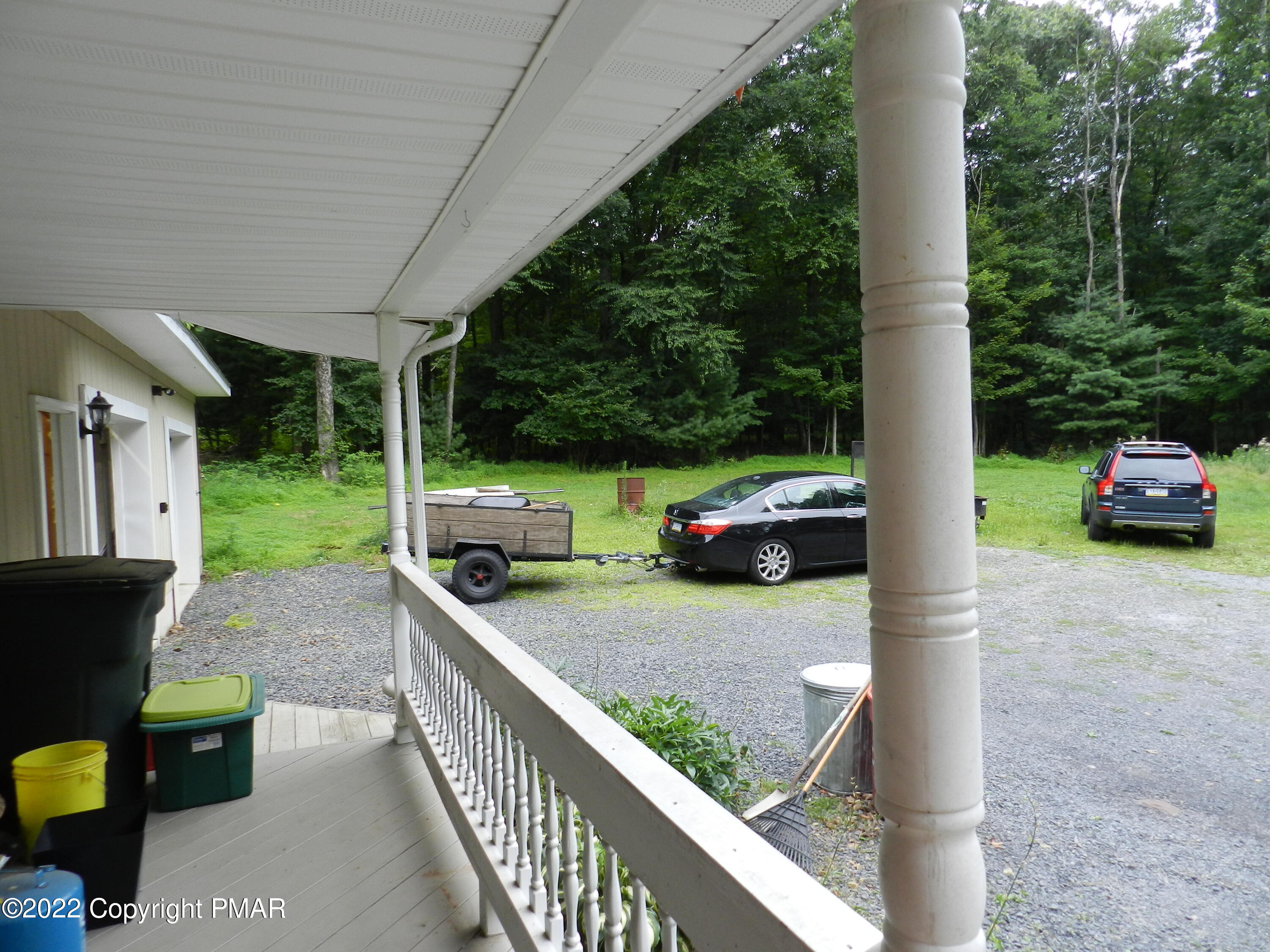 1269 Burger Hollow Road Effort, PA 18330 - Photo 17 of 49 a view of a patio with two chairs and a table