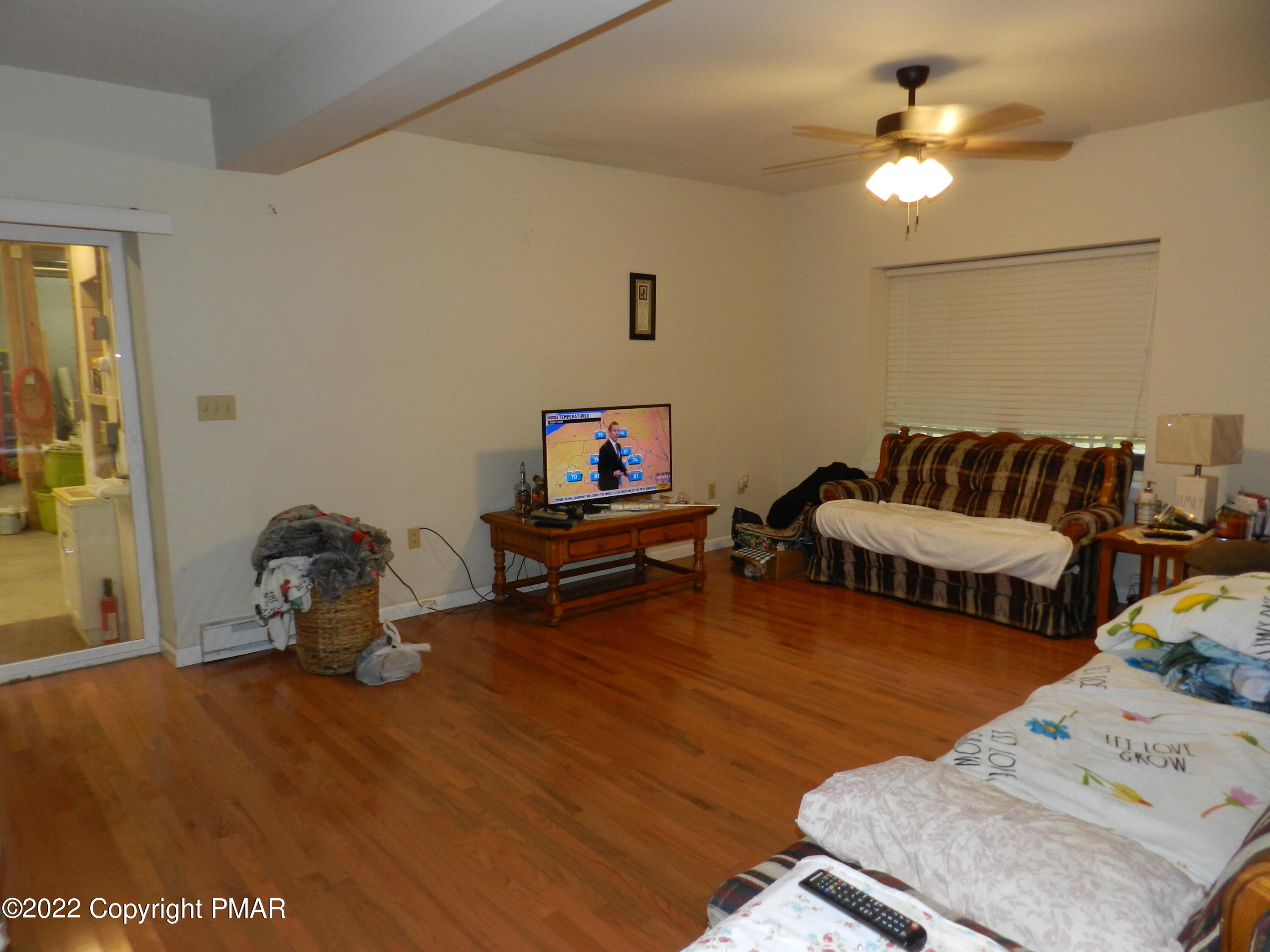 1269 Burger Hollow Road Effort, PA 18330 - Photo 20 of 49 a bedroom with furniture and a wooden floor