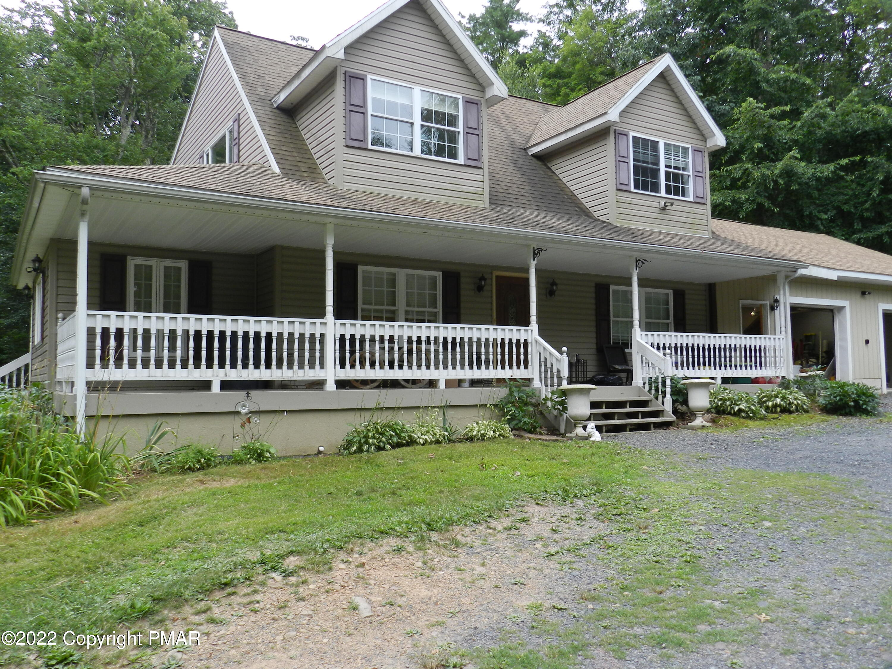 1269 Burger Hollow Road Effort, PA 18330 - Photo 2 of 49 a front view of a house with a yard