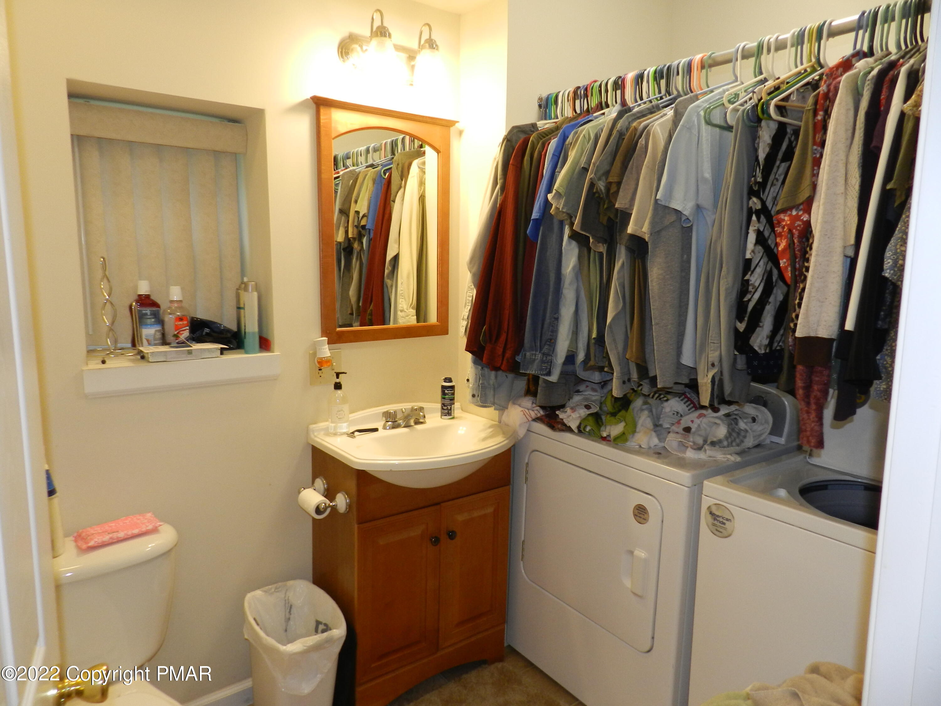 1269 Burger Hollow Road Effort, PA 18330 - Photo 28 of 49 a bathroom with a sink a toilet and a mirror