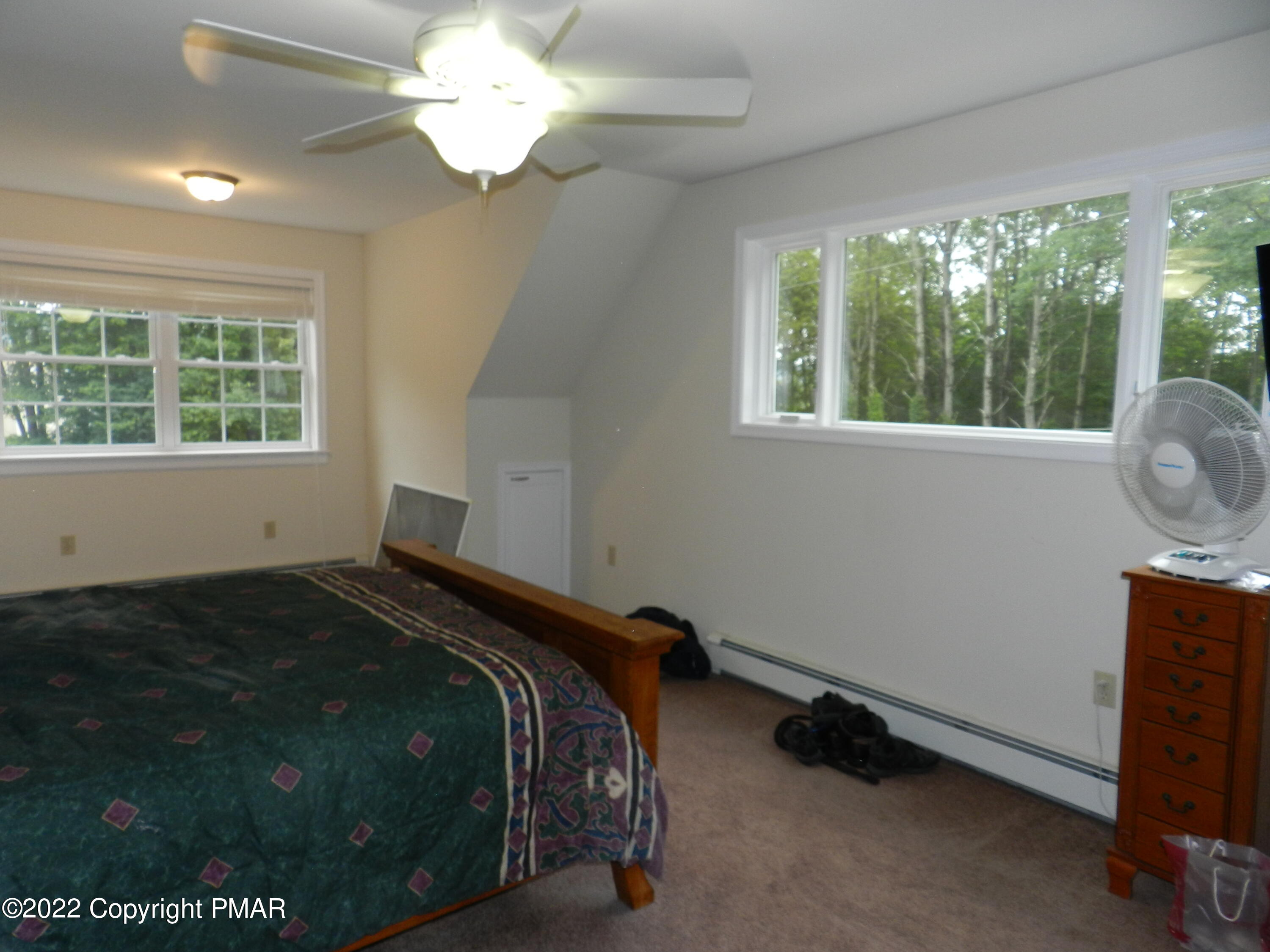 1269 Burger Hollow Road Effort, PA 18330 - Photo 29 of 49 a bedroom with a bed and a window