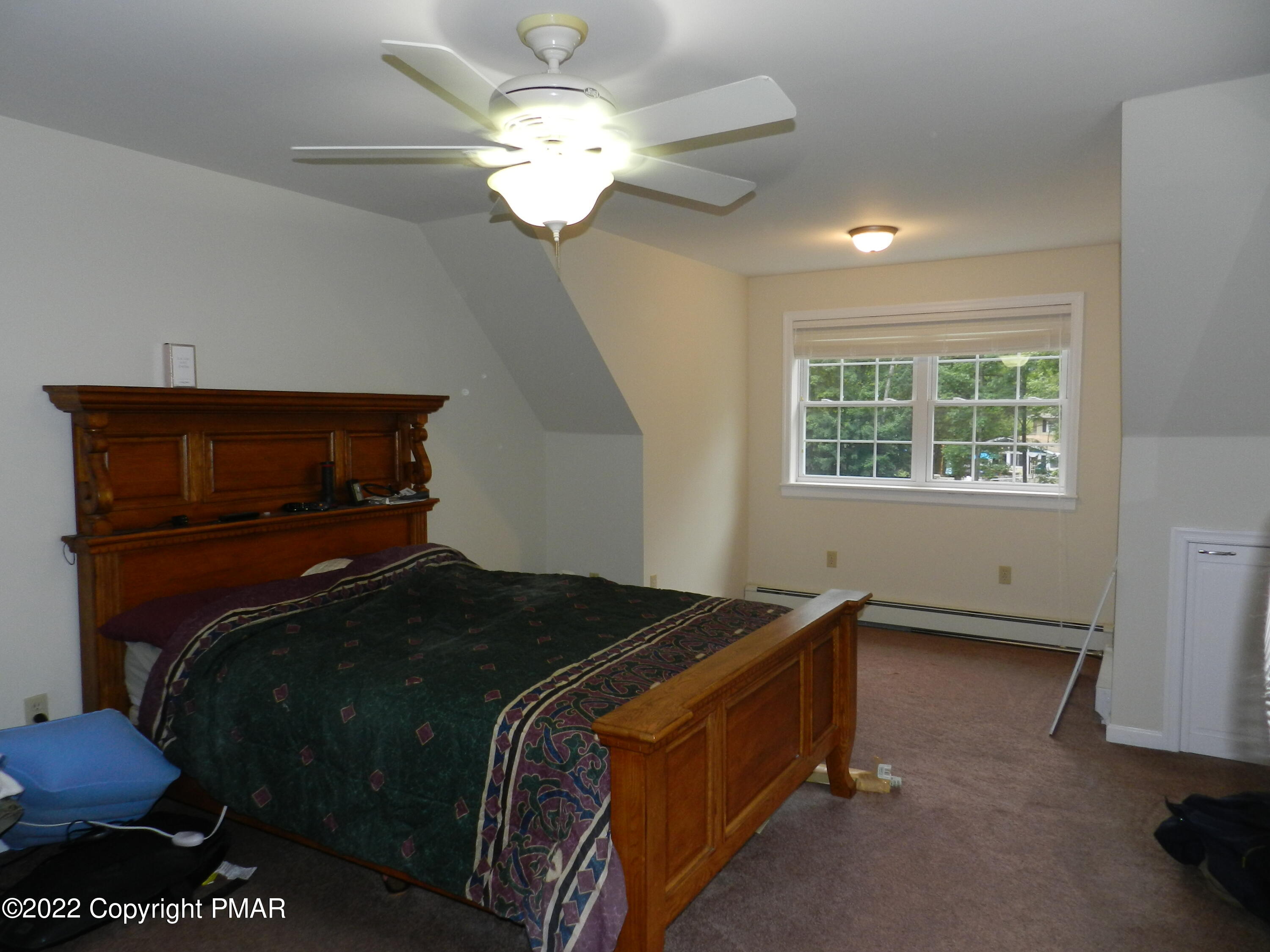1269 Burger Hollow Road Effort, PA 18330 - Photo 30 of 49 a bedroom with a bed and a window