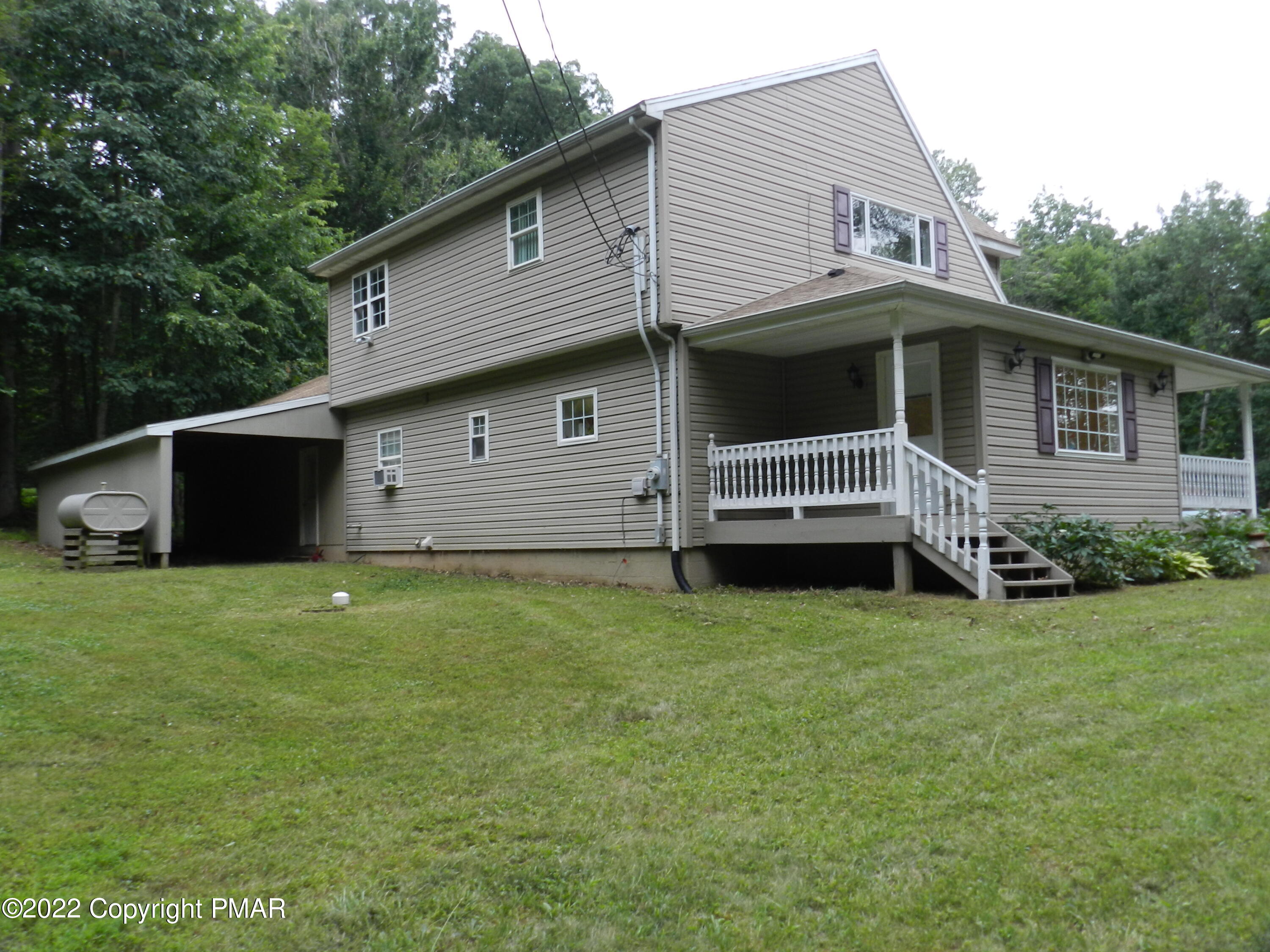 1269 Burger Hollow Road Effort, PA 18330 - Photo 6 of 49 a front view of a house with a garden