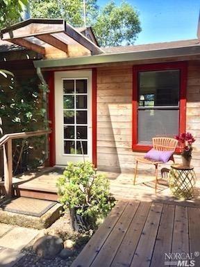 9087 Barnett Valley Road Sebastopol, CA 95472 - Photo 1 of 1 a front view of a house with outdoor seating