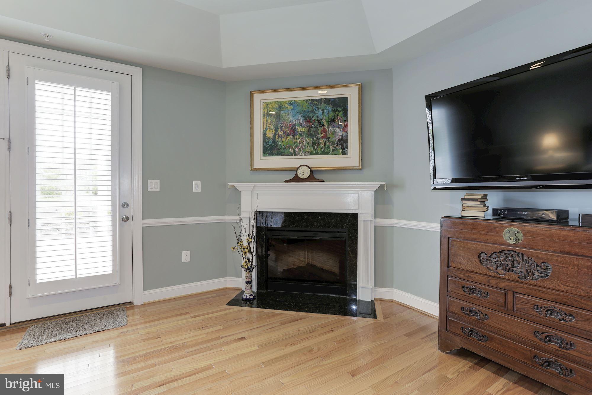 3839 Wayson Road Davidsonville, MD 21035 - Photo 31 of 82 Electric Fireplace & Access to Rear Deck