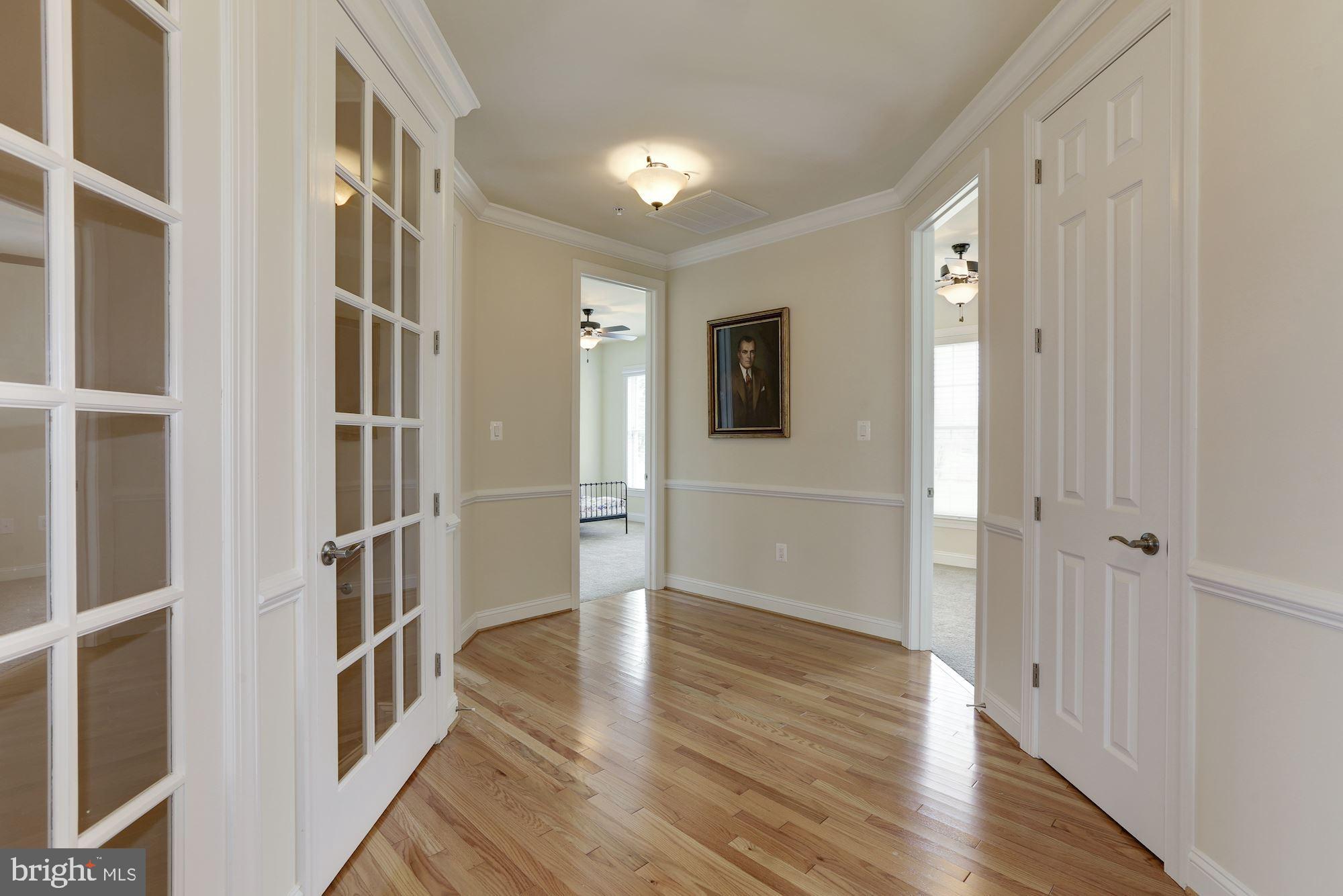 3839 Wayson Road Davidsonville, MD 21035 - Photo 43 of 82 Upper Level Landing w/ Hardwood floors