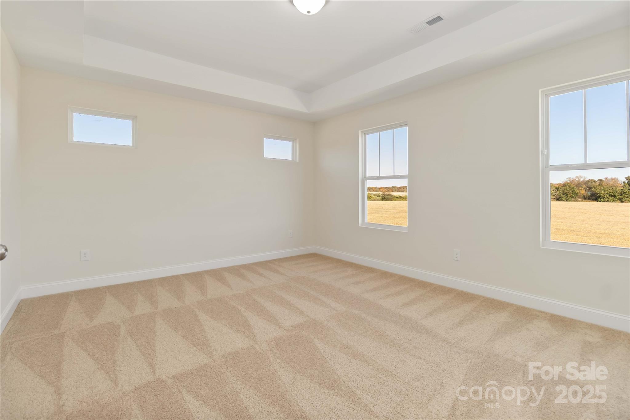 1018 Heath Helms Road Monroe, NC 28110 - Photo 22 of 38 a view of an empty room with a window