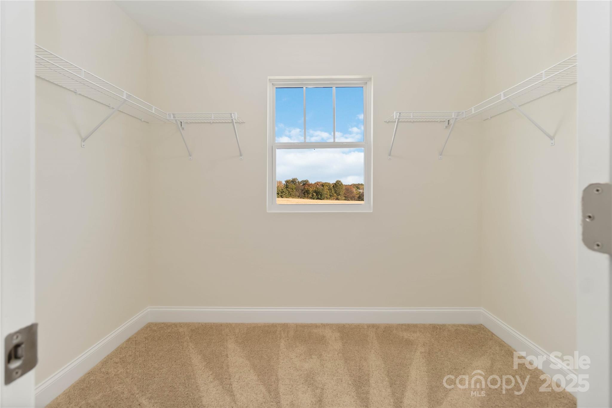 1018 Heath Helms Road Monroe, NC 28110 - Photo 24 of 38 a view of an empty room with a window