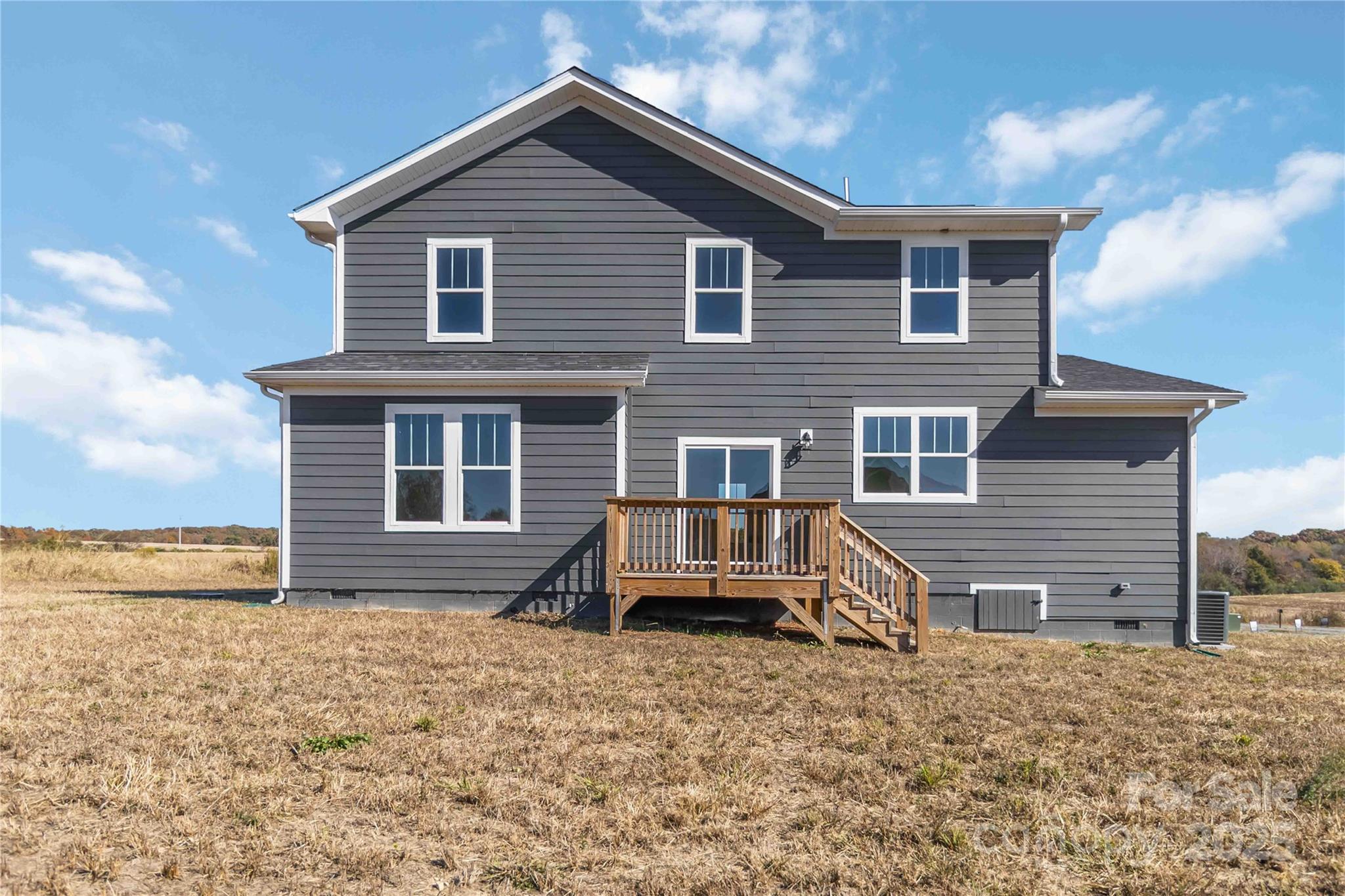 1018 Heath Helms Road Monroe, NC 28110 - Photo 28 of 38 a front view of a house with garden