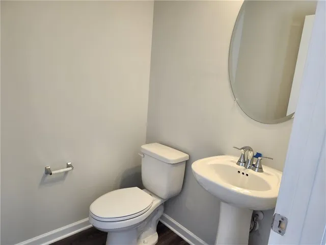 a bathroom with a sink and a toilet