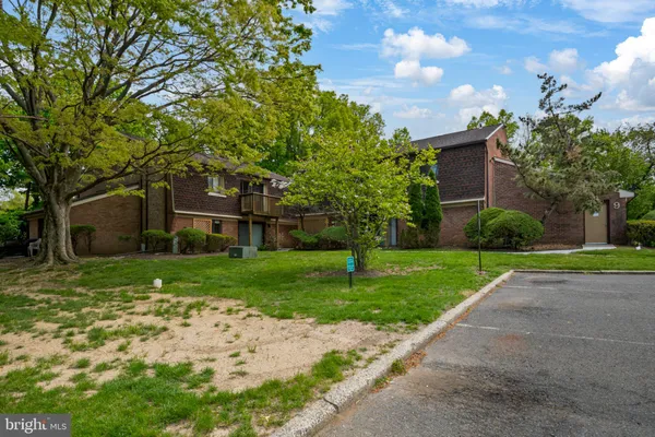 a view of a big yard next to a house