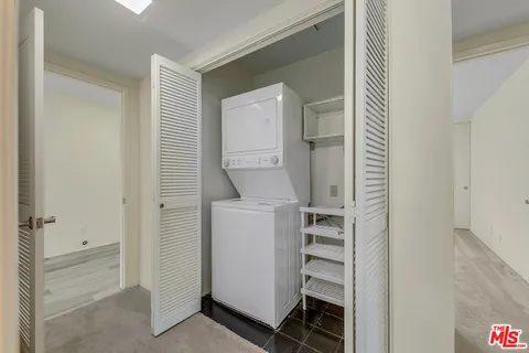 a room with a dryer and washer