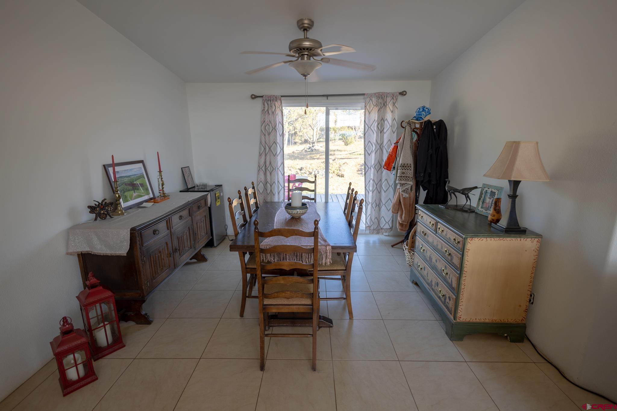 13569 3100th Road Hotchkiss, CO 81419 - Photo 13 of 31 a living room with furniture and a window