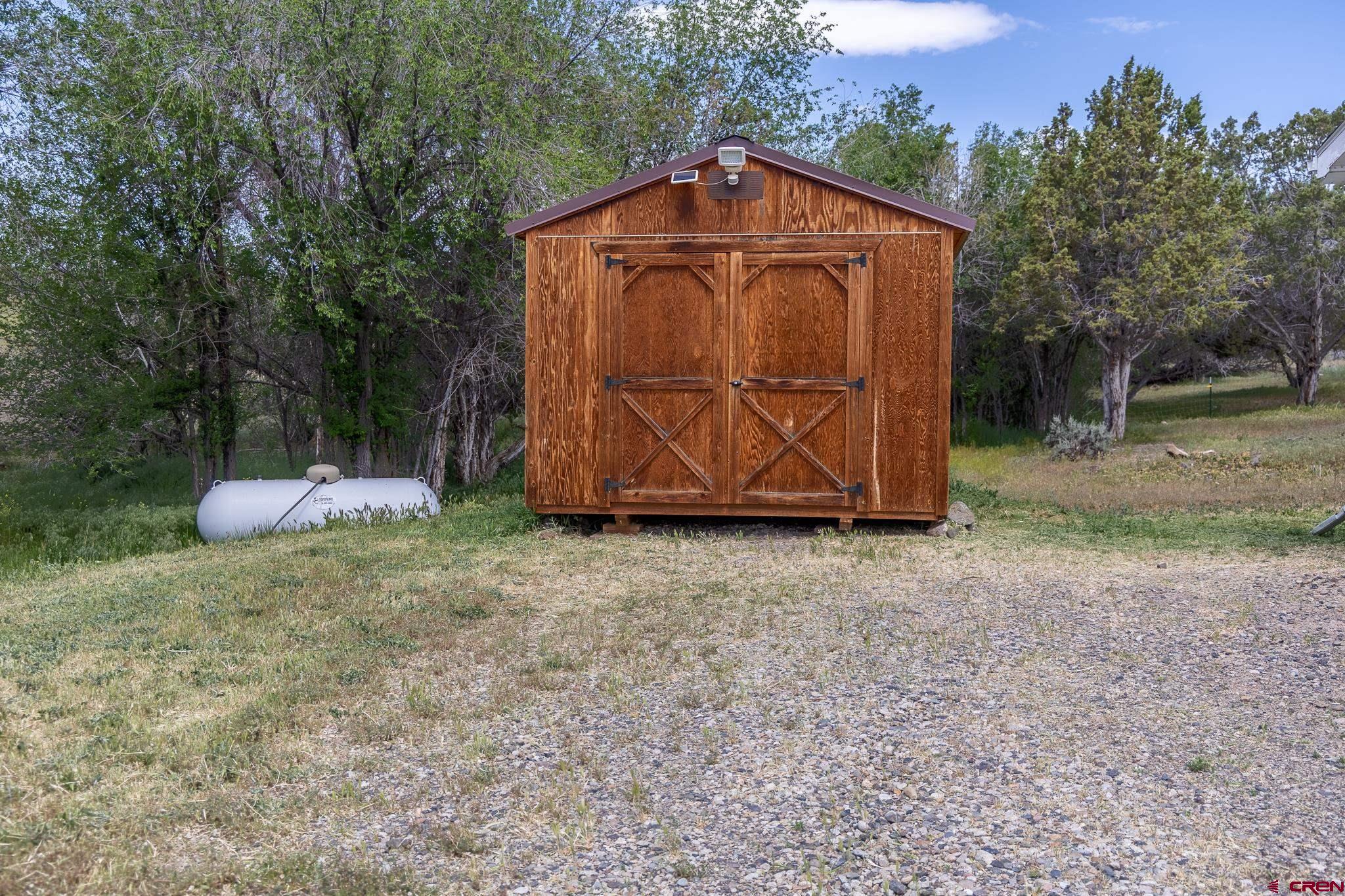 13569 3100th Road Hotchkiss, CO 81419 - Photo 20 of 29 a view of backyard of house