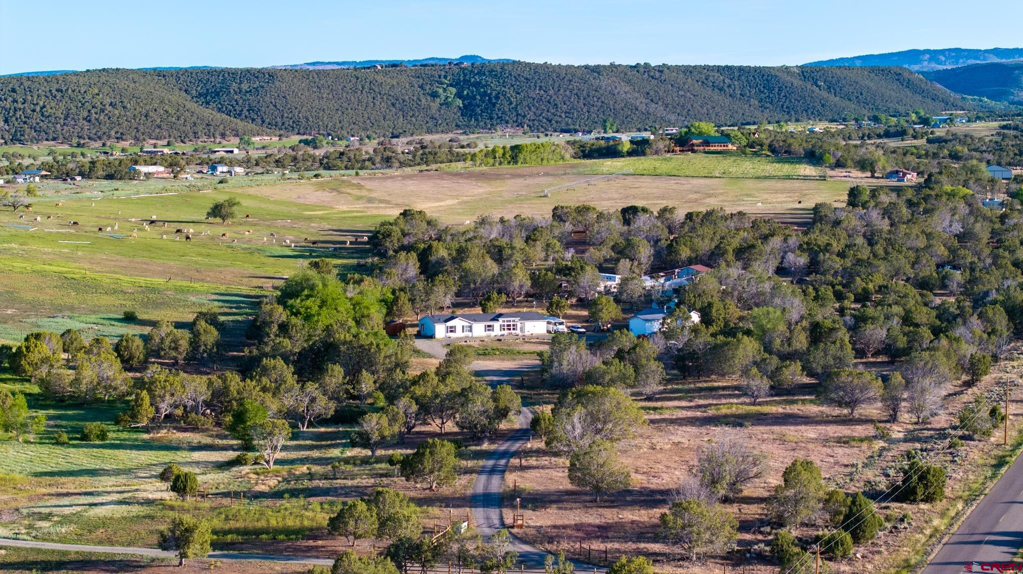 13569 3100th Road Hotchkiss, CO 81419 - Photo 2 of 29 a view of a city with an ocean