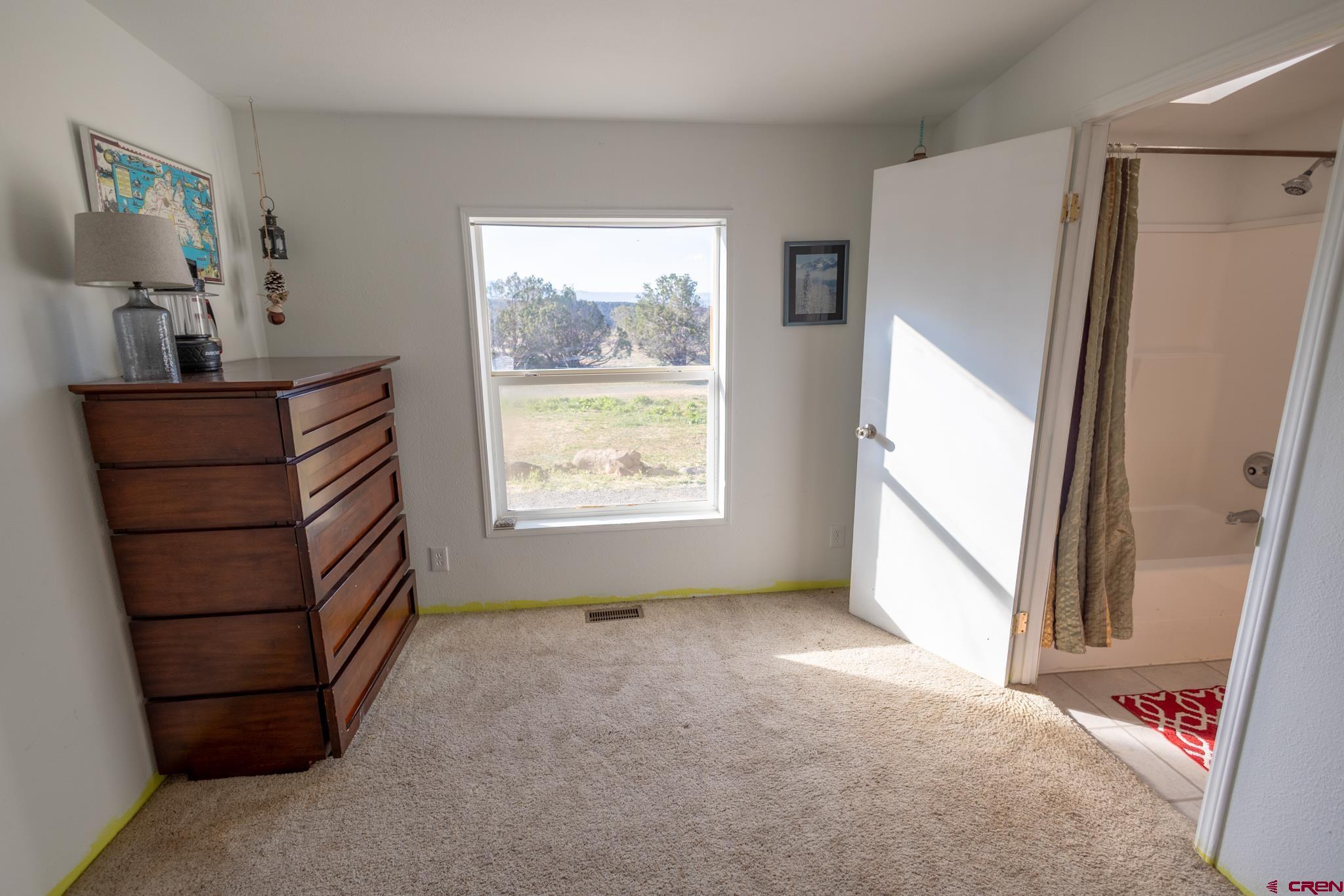 13569 3100th Road Hotchkiss, CO 81419 - Photo 26 of 31 a view of room with window and cabinet