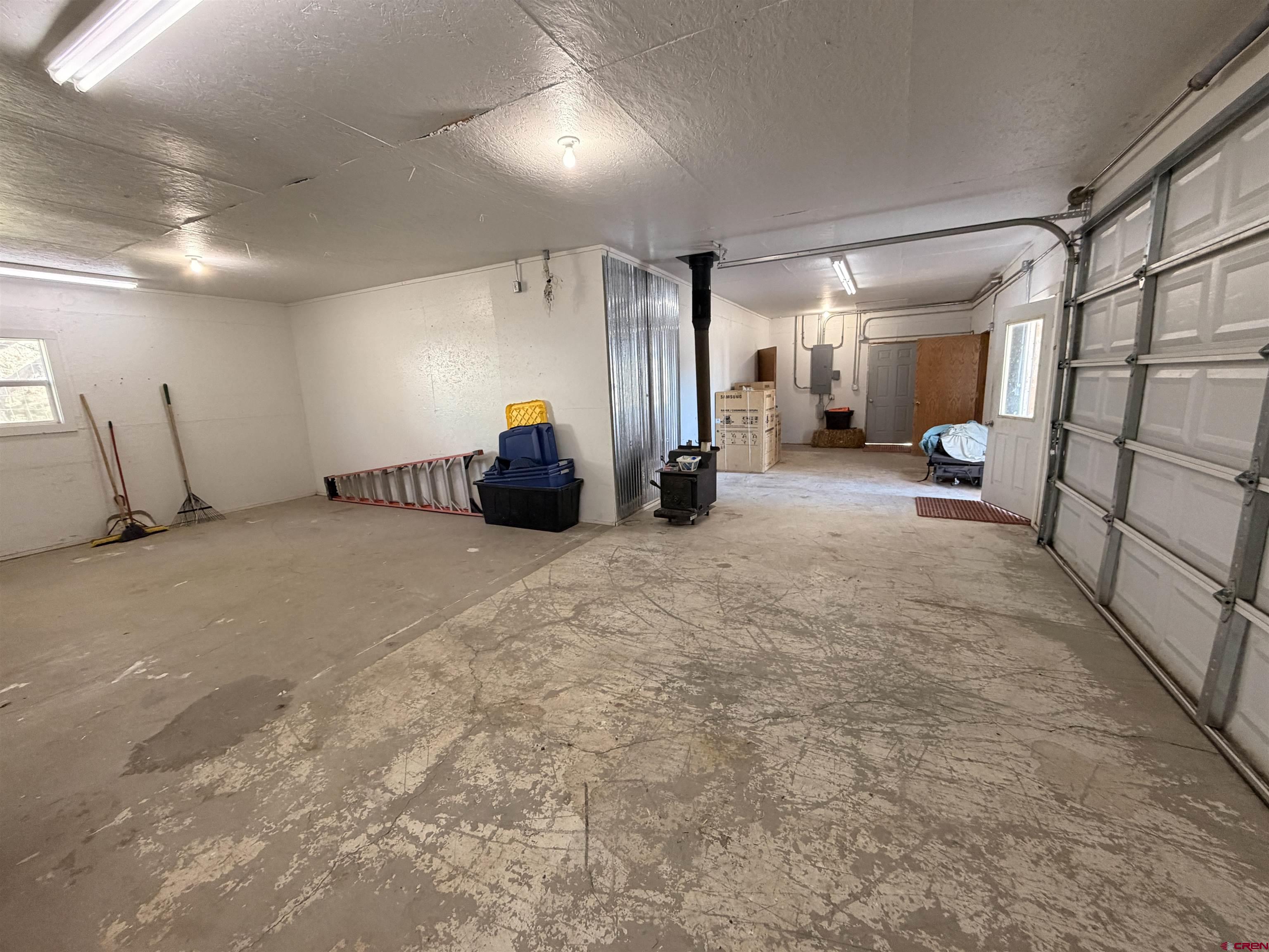 13569 3100th Road Hotchkiss, CO 81419 - Photo 28 of 35 a view of a room with gym equipment and a large window