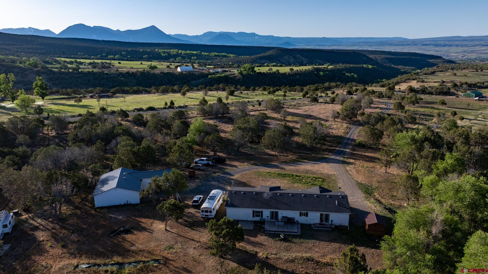 13569 3100th Road Hotchkiss, CO 81419 - Photo 6 of 31 a view of a city from a lake