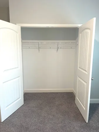 a bathroom with a shower and a toilet