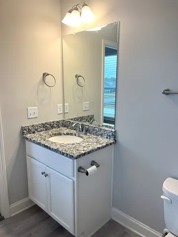 a view of a room with racks on the wall