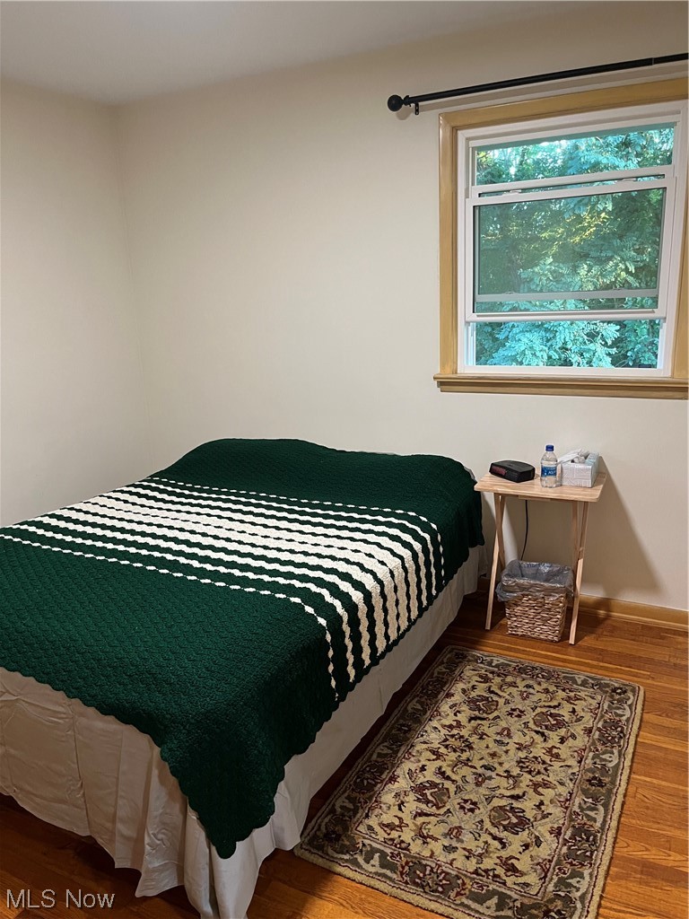 12764 Huntoon Road Painesville, OH 44077 - Photo 22 of 35 View of hardwood floored bedroom