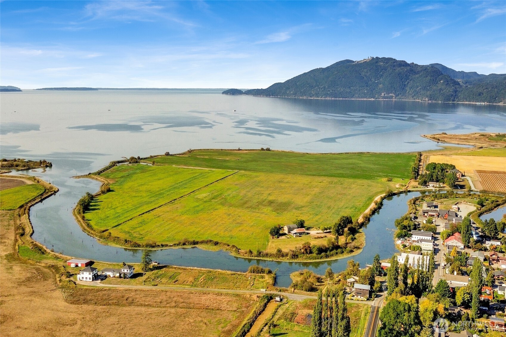 5544 Smith Road Bow, WA 98232 - Photo 11 of 40 a view of a swimming pool with an ocean view