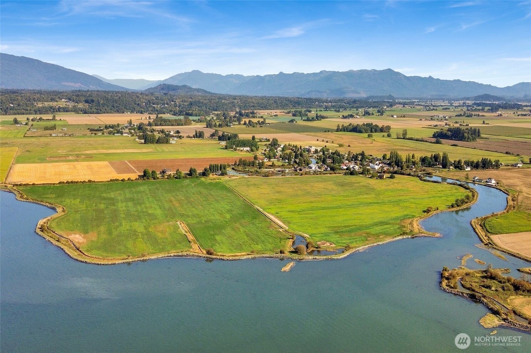 5544 Smith Road Bow, WA 98232 - Photo 15 of 40 a view of a city with an ocean